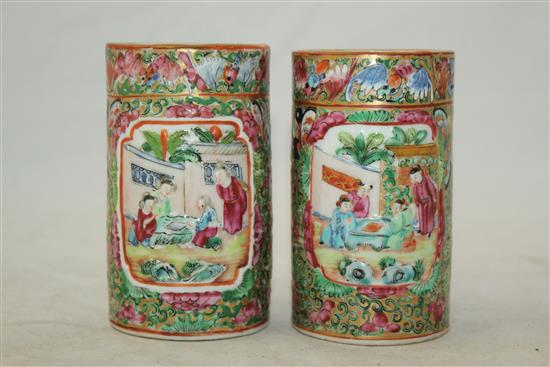 Pair of Chinese famille rose cylindrical brush pots, mid 19th century, 10.5cm., one cracked(-)